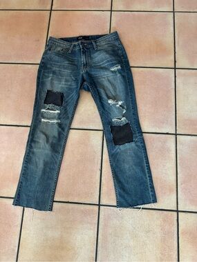 Jet Distressed Blue Denim Jeans with Patch Details
